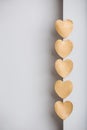 Gold heart stickers on grey textured background Royalty Free Stock Photo