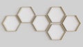 Gold hexagon blank photo frames mockup hanging on interior wall. Hexagonal pictures on painted surface. 3D rendering Royalty Free Stock Photo