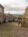 gold hill shaftesbury beautiful old england walkway path cottage Royalty Free Stock Photo