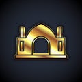 Gold Hindu spiritual temple icon isolated on black background. Vector