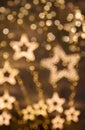 Golden christmas stars lights blur background stock images Royalty Free Stock Photo