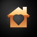 Gold House with heart inside icon isolated on black background. Love home symbol. Family, real estate and realty. Vector