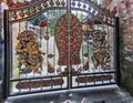 A gold-incrustated gates at balinese hindu temple on Bali island in Indonesia