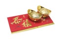 Gold Ingots and Red Packet Royalty Free Stock Photo