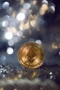 gold iron coin ethereum on shiny silver background