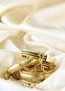 Gold jewelry, bracelets and chains Royalty Free Stock Photo