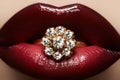 Gold jewelry. Fashion lips make-up & diamond ring Royalty Free Stock Photo