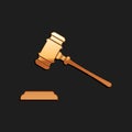 Gold Judge gavel icon isolated on black background. Gavel for adjudication of sentences and bills, court, justice, with
