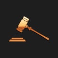 Gold Judge gavel icon isolated on black background. Gavel for adjudication of sentences and bills, court, justice, with