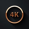 Gold 4k Ultra HD icon isolated on black background. Long shadow style. Vector.