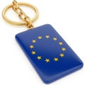 A gold keychain with a rectangular pendant featuring the European Union flag on a white background Royalty Free Stock Photo