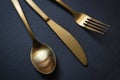 Golden spoon, knife and fork