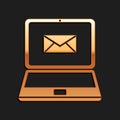 Gold Laptop with envelope and open email on screen icon isolated on black background. Email marketing, internet Royalty Free Stock Photo