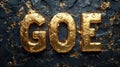 Gold letters GOE on dark textured background Royalty Free Stock Photo