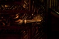 Gold lever door handle on decorative architectural detail Royalty Free Stock Photo