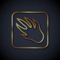 Gold line Alligator crocodile paw footprint icon isolated on black background. Vector