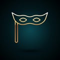 Gold line Festive mask icon isolated on dark blue background. Merry Christmas and Happy New Year. Vector Royalty Free Stock Photo