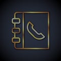 Gold line Phone book icon isolated on black background. Address book. Telephone directory. Vector