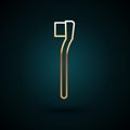 Gold line Toothbrush icon isolated on dark blue background. Vector Illustration