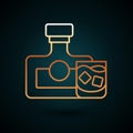 Gold line Whiskey bottle and glass icon isolated on dark blue background. Vector