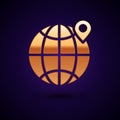 Gold Location on the globe icon isolated on black background. World or Earth sign. Vector Illustration