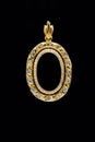 Gold locket frame pendant with diamond