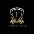 Gold Luxury Shield F Letter Logo Royalty Free Stock Photo