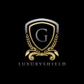 Gold Luxury Shield G Letter Logo Royalty Free Stock Photo