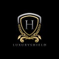 Gold Luxury Shield H Letter Logo Royalty Free Stock Photo