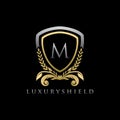 Gold Luxury Shield M Letter Logo Royalty Free Stock Photo