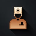 Gold Male doctor icon isolated on black background. Long shadow style. Vector