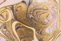 Gold marbling texture design. Pink and golden marble pattern. Fluid art.