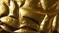 Gold material folds with highlights and deep shadows create depth Royalty Free Stock Photo