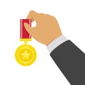 Gold medal in hand. Royalty Free Stock Photo