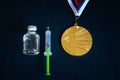 Gold Medal, Syringe and Medicine bottle for injection. Doping in sport, black edit space Royalty Free Stock Photo