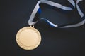 Gold medal on velvet cushion. Olympic games Royalty Free Stock Photo