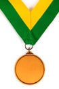 Gold medal on white background with blank face for text, Gold medal in the foreground.