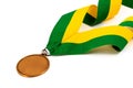 Gold medal on white background with blank face for text, Gold medal in the foreground.