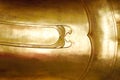 Gold metal Buddha statue abstract background