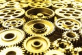 Gold metal cog wheels. Royalty Free Stock Photo