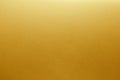 Gold metal texture background. Golden shiny metallic plate textured flat surface with smooth light reflection Royalty Free Stock Photo