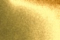 Gold metallic background, foil, linen texture, bright festive background Royalty Free Stock Photo