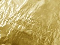 Gold metallic crumpled foil texture background Royalty Free Stock Photo
