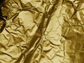 Gold metallic crumpled foil texture background Royalty Free Stock Photo