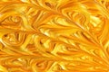 Gold metallic glitter paint swirls Royalty Free Stock Photo