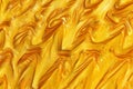 Gold metallic glitter paint swirls Royalty Free Stock Photo