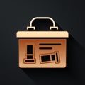 Gold Military ammunition box with some ammo bullets icon isolated on black background. Long shadow style. Vector