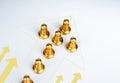 Gold moving forward arrows with the golden pawn chess piece.