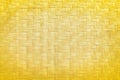 Gold natural wood texture background,Thai traditional handcraft weave,made from dried plants reed or cyperus, imbricatus