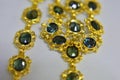 Gold necklace Decorated with genuine emerald stones